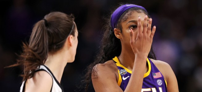 LSU forward Angel Reese making the “you can’t see me” gesture in front of Iowa guard Caitlin Clark during an NCAA championship game in 2023.